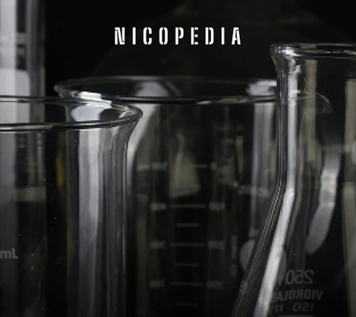 image shows scientific beakers, indicating clinical trial regarding vapes effectiveness over NRTs for quitting smoking