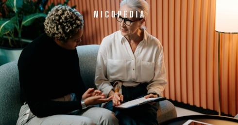 woman giving advice to another woman, highlighting how advice and vapes can help with smoking cessation