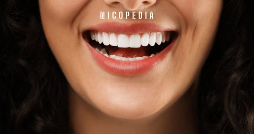 woman smiling, improved oral health from nicotine pouches