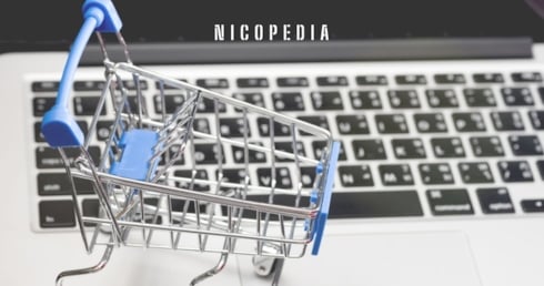 image of a shopping trolley next to a computer keyboard, indicating importance of online access to nicotine products