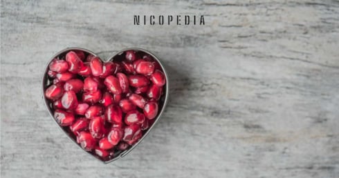 Image of fruit in heart shape, highlighting connection between nicotine and heart health, like blood pressure