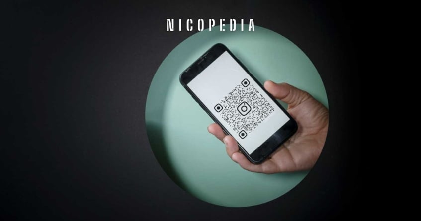 Hand holds phone with QR code, a method of identifying fake nicotine pouches