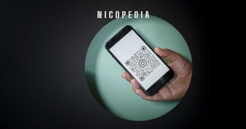 Hand holds phone with QR code, a method of identifying fake nicotine pouches