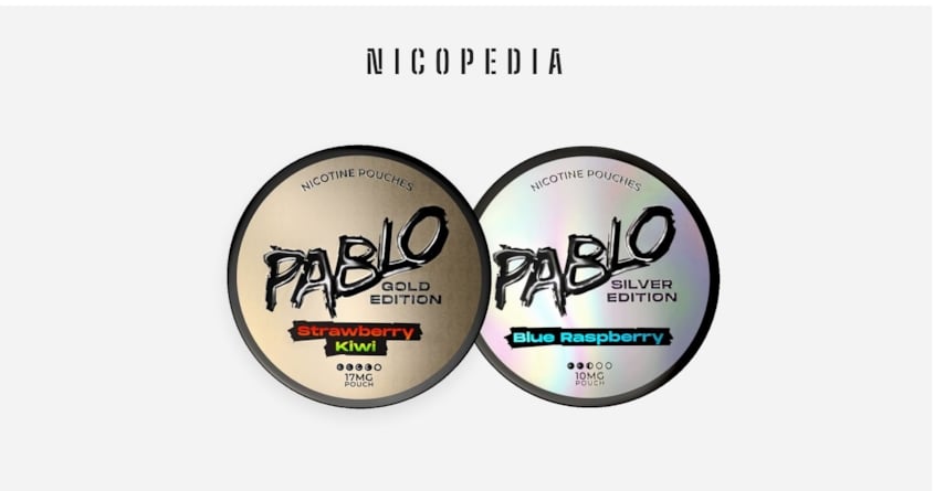 a PABLO gold strawberry kiwi can and PABLO silver blue raspberry can