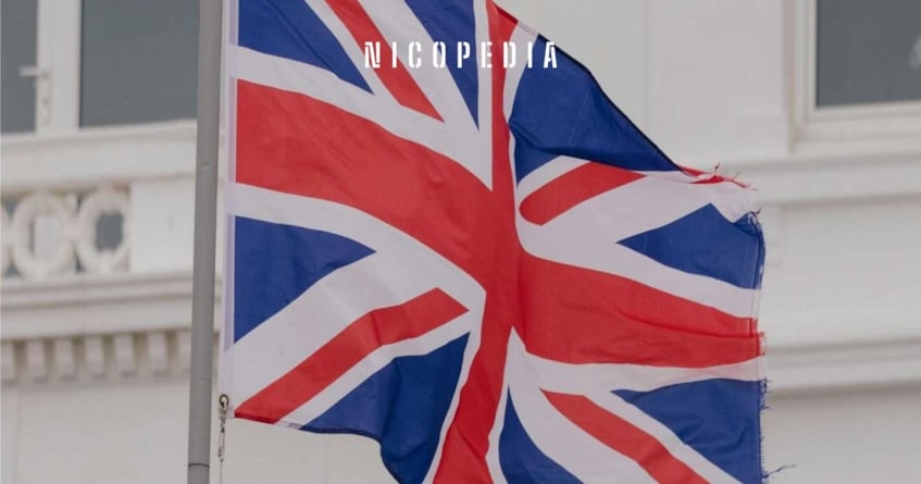 UK flag set against white building