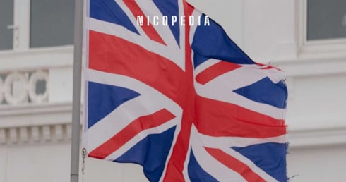 UK flag set against white building