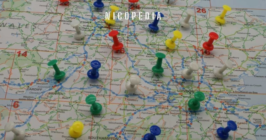 Map of England with drawing pins across the map