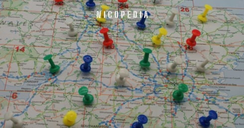 Map of England with drawing pins across the map