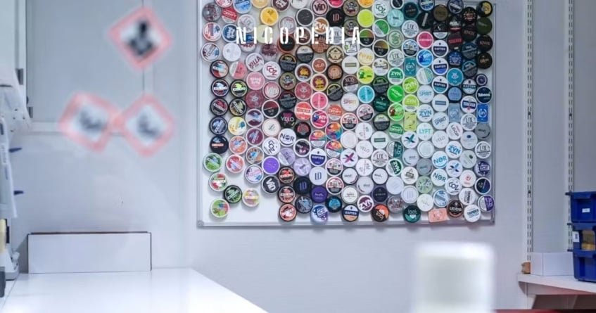 nicotine pouch cans on the wall