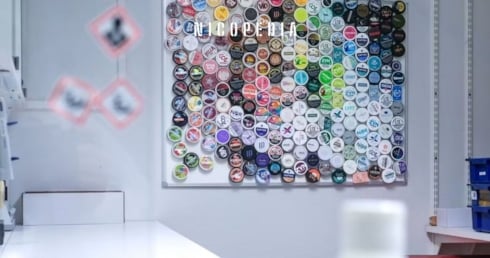 nicotine pouch cans on the wall